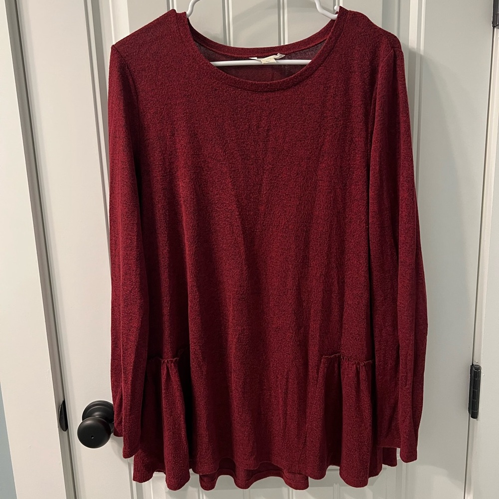 Women’s long sleeve peplum top. Very soft.